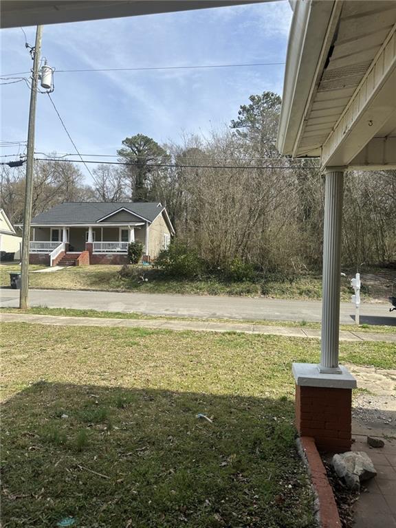 303 Grady Avenue Northeast Rome, GA 30161 - Photo 2 of 17 a view of a house with a yard