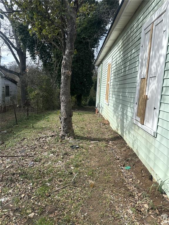 303 Grady Avenue Northeast Rome, GA 30161 - Photo 3 of 17 a view of backyard with green space