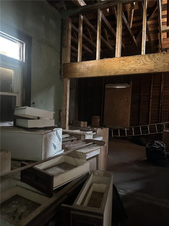 303 Grady Avenue Northeast Rome, GA 30161 - Photo 8 of 17 a kitchen with a stove and a microwave