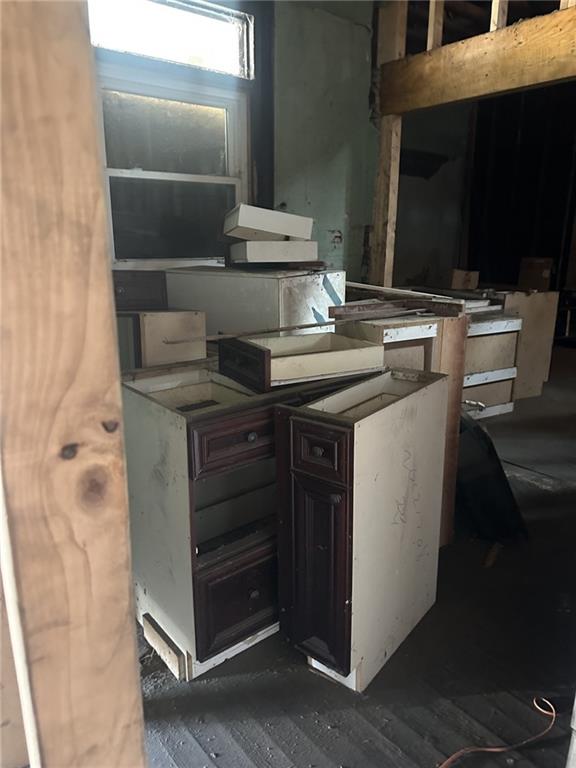 303 Grady Avenue Northeast Rome, GA 30161 - Photo 10 of 17 a kitchen with a sink and cabinets