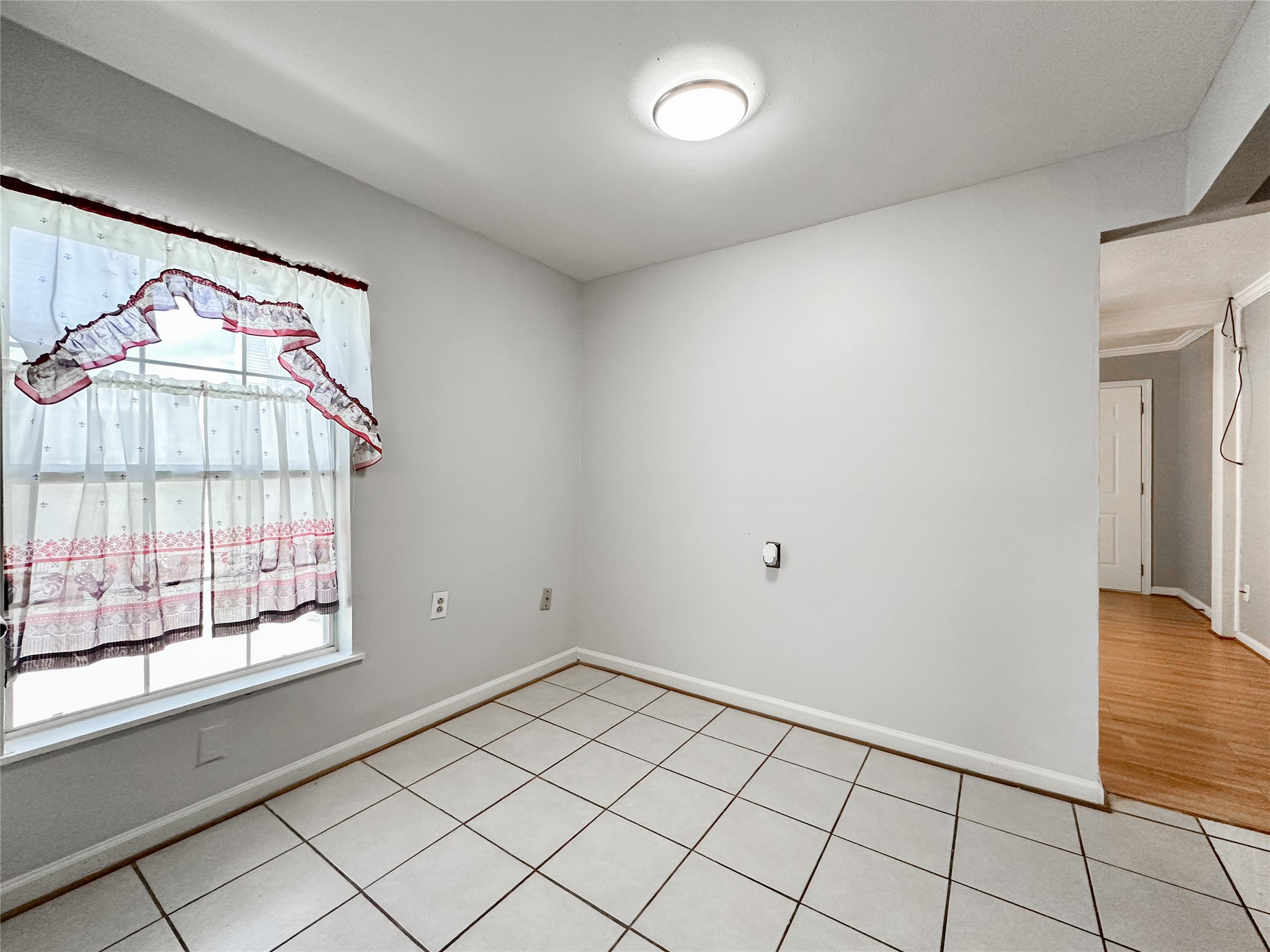 132 Grothe Lane Houston, TX 77022 - Photo 18 of 36 a view of an empty room and window