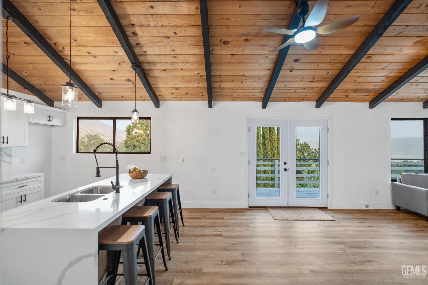 Undisclosed Address Tehachapi, CA 93561 - Photo 32 of 60 a view of a dining room with furniture and wooden floor