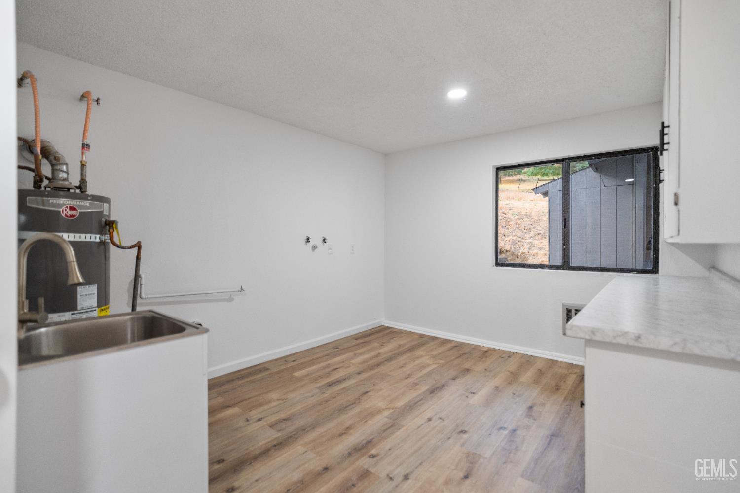Undisclosed Address Tehachapi, CA 93561 - Photo 44 of 60 a view of a room that has a bed and a mirror in it