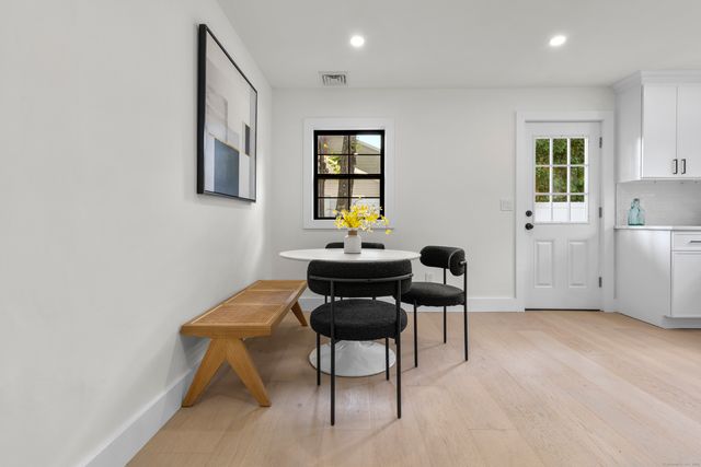 a view of a livingroom with furniture and window