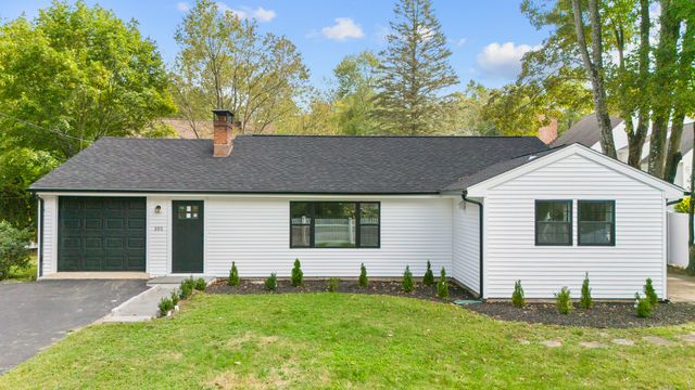 a front view of house with yard
