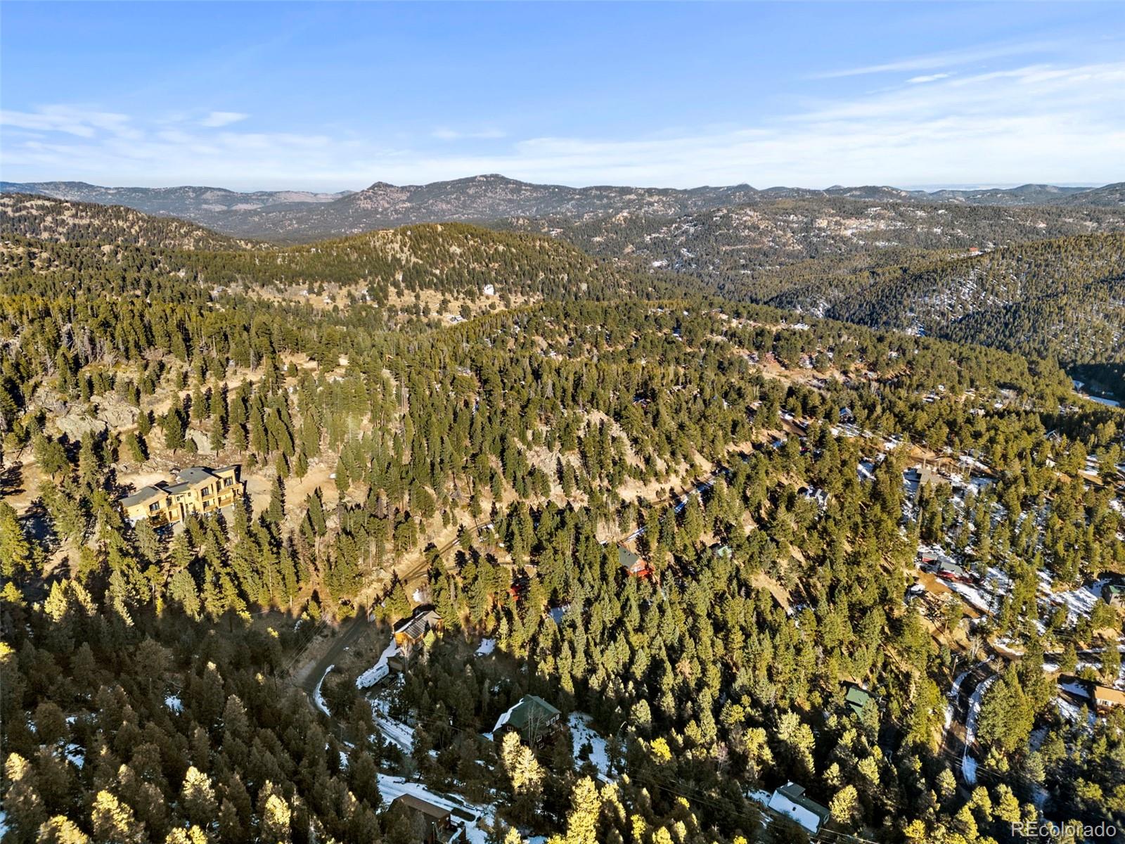 Ridge Road Evergreen, CO 80439 - Photo 9 of 22 a view of a city with mountains