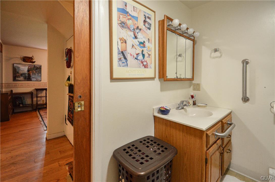 234 Rinker Road Stroudsburg, PA 18360 - Photo 22 of 49 a bathroom with a sink toilet and a mirror