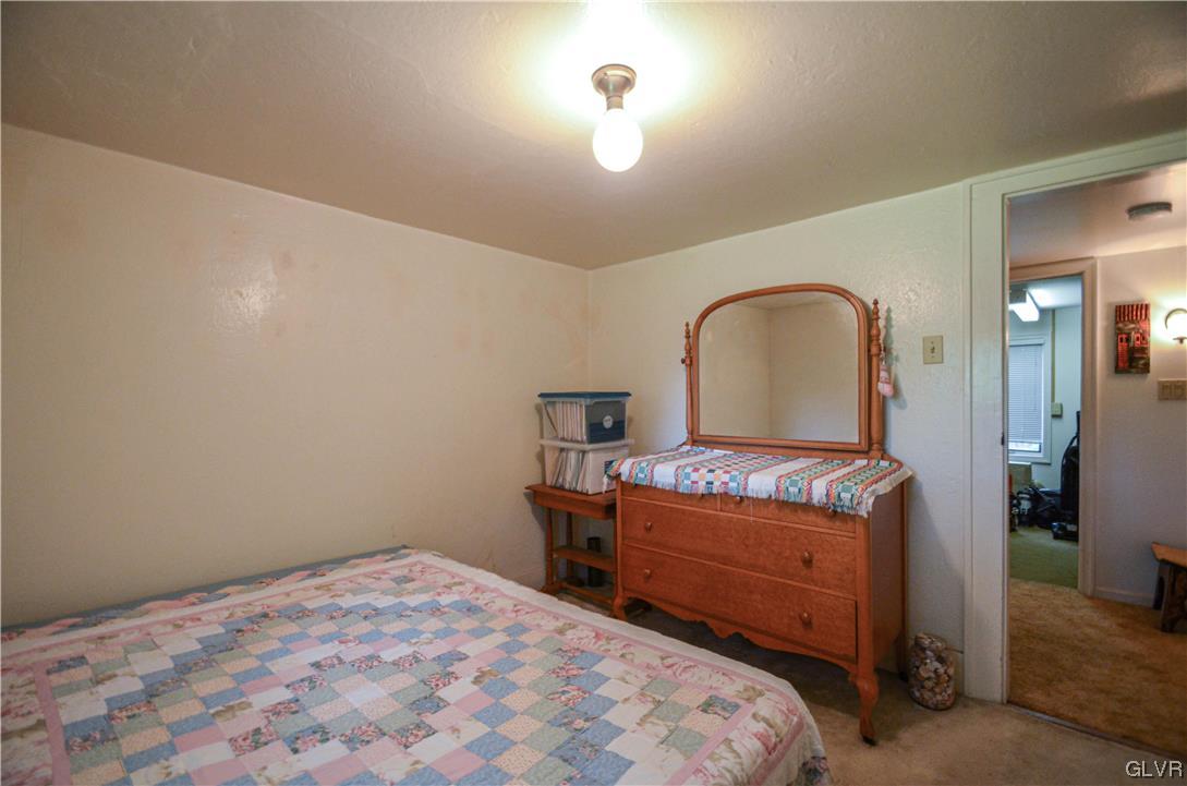 234 Rinker Road Stroudsburg, PA 18360 - Photo 28 of 49 a bedroom with a bed and a window