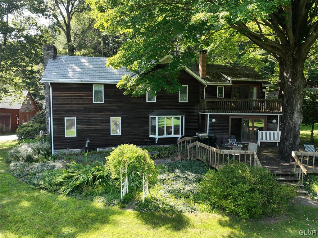 234 Rinker Road Stroudsburg, PA 18360 - Photo 44 of 49 a front view of house with a garden