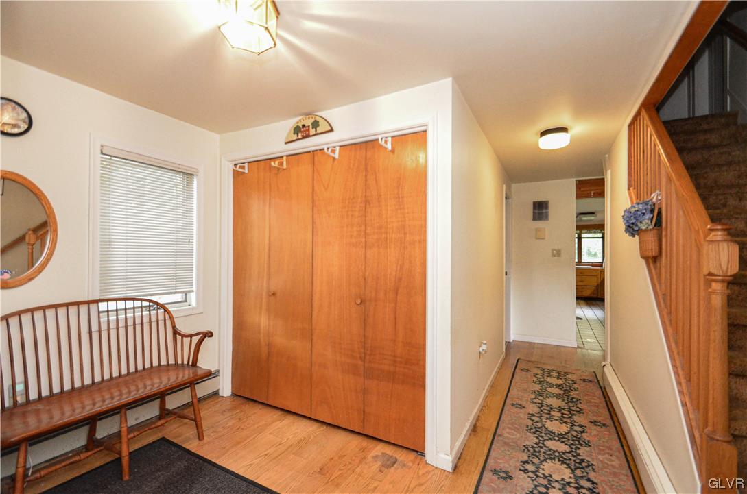 234 Rinker Road Stroudsburg, PA 18360 - Photo 6 of 49 a view of a hallway with wooden floor and stairs