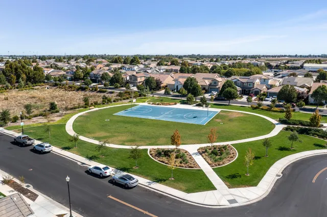 a view of a swimming pool with a garden