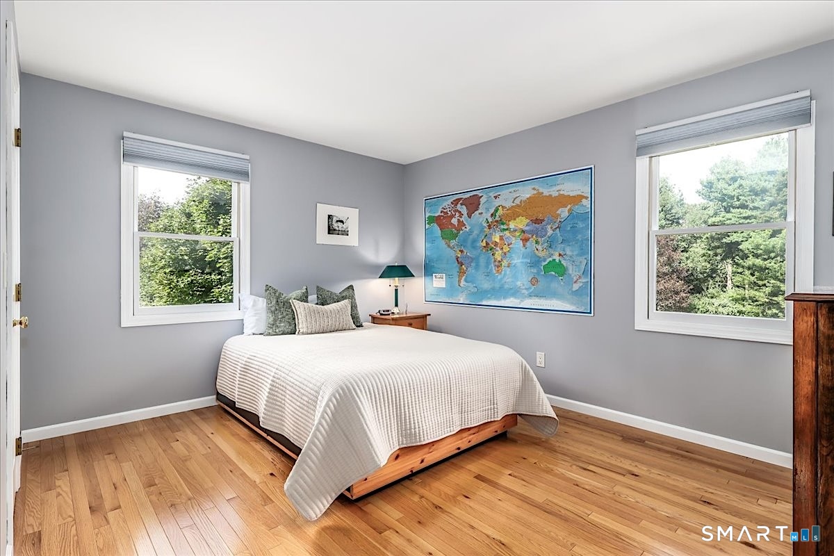 14 Philo Curtis Road Newtown, CT 06482 - Photo 25 of 34 Generously Sized Bedroom with Gleaming Hardwood Floors