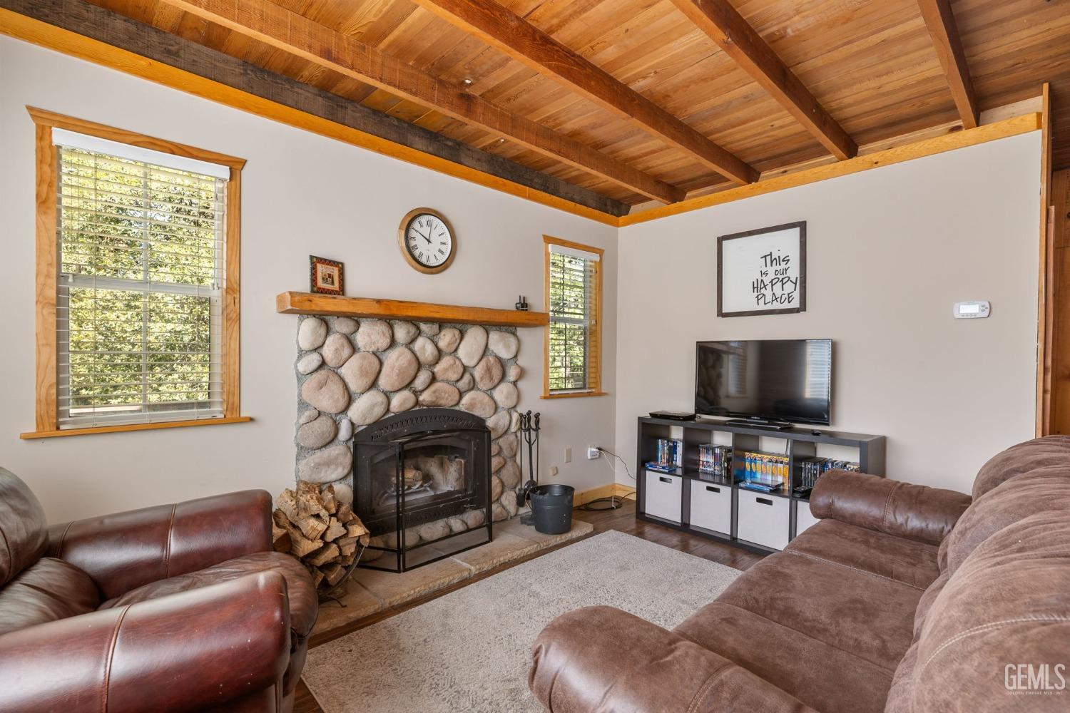 Undisclosed Address Posey, CA 93260 - Photo 14 of 53 a living room with furniture a fireplace and a flat screen tv