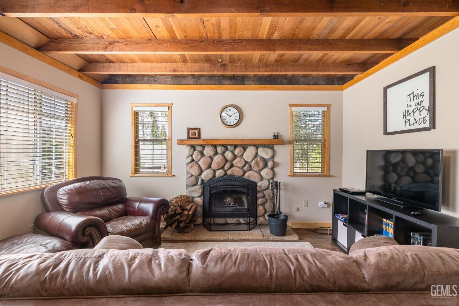Undisclosed Address Posey, CA 93260 - Photo 18 of 53 a living room with furniture and a fireplace