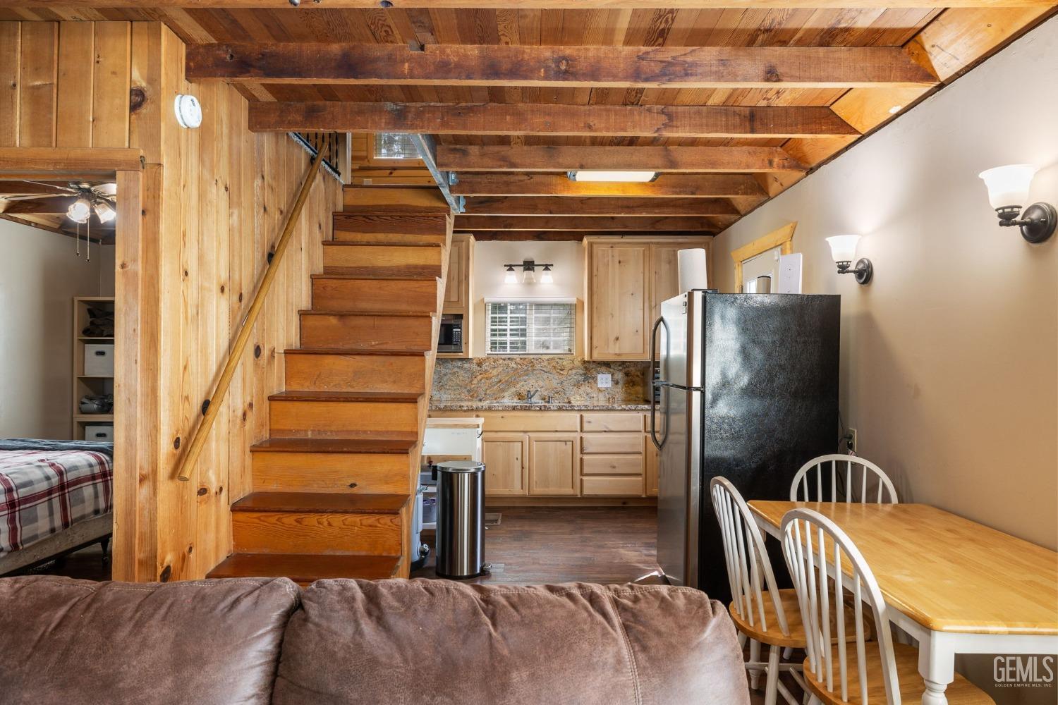 Undisclosed Address Posey, CA 93260 - Photo 20 of 53 a bedroom with bed and wooden floor