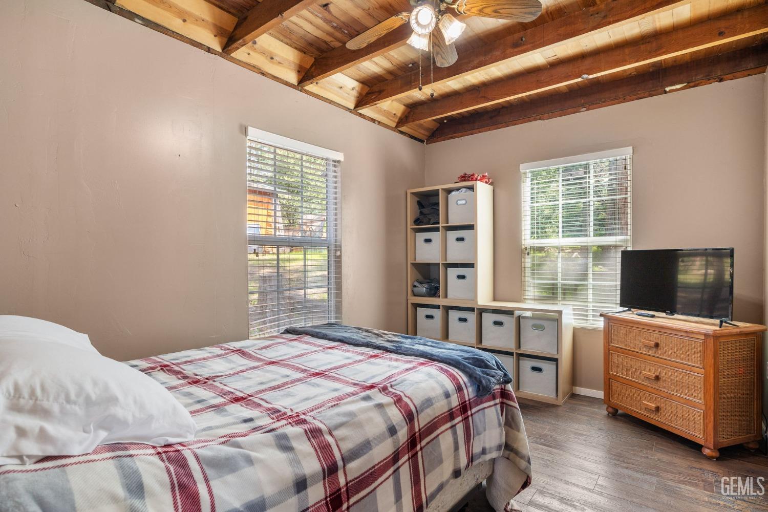 Undisclosed Address Posey, CA 93260 - Photo 23 of 53 a bedroom with a large bed and a flat tv screen