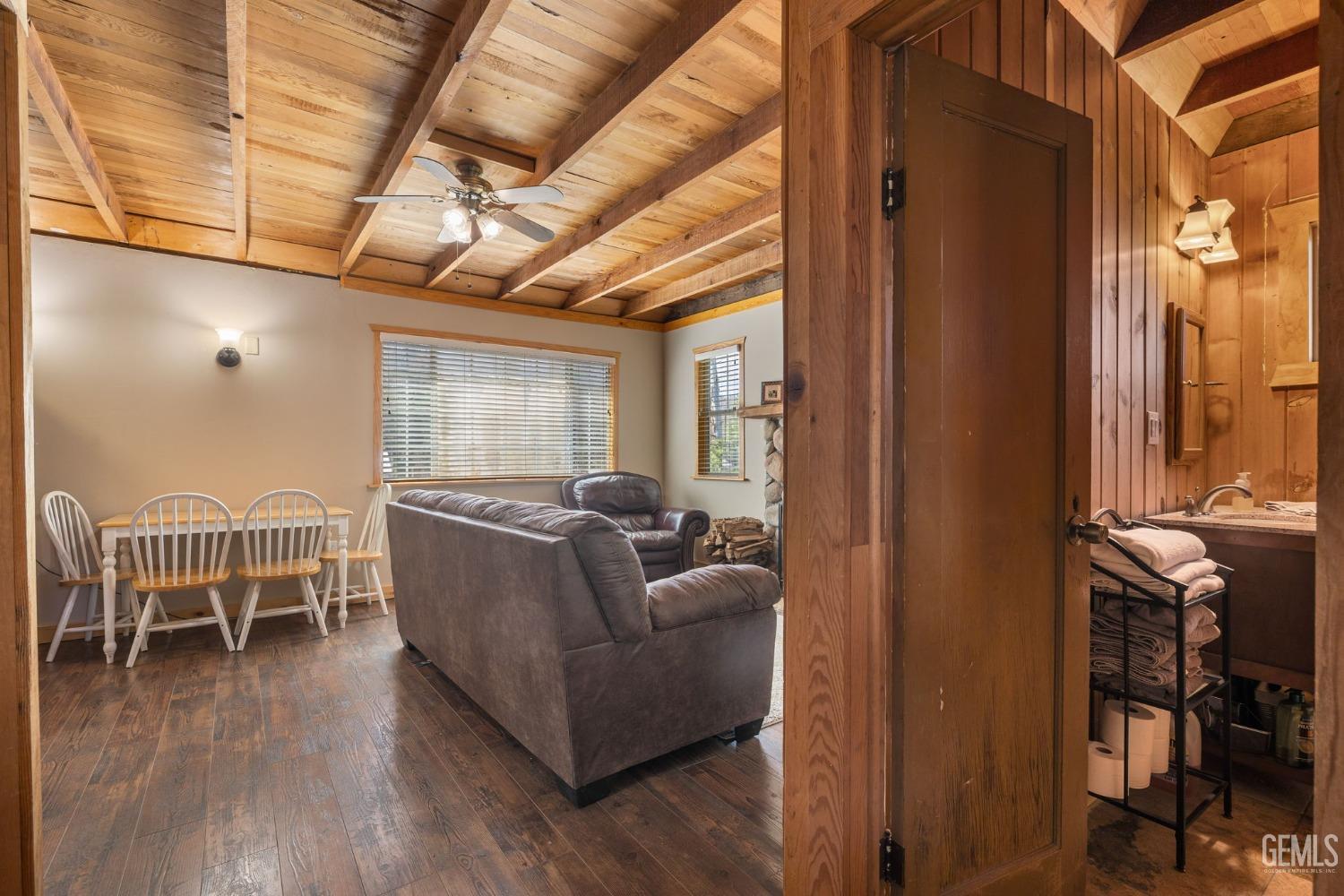 Undisclosed Address Posey, CA 93260 - Photo 10 of 53 a living room with furniture a wooden floor and a window