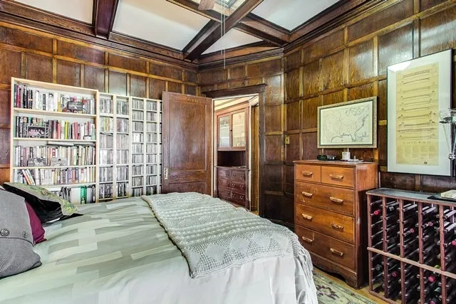 a bedroom with a bed and a closet