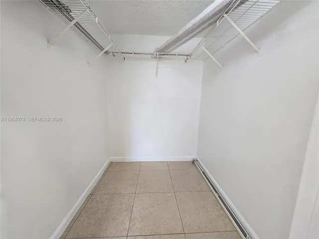 a view of a room with racks on the wall