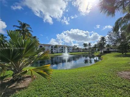 a view of a lake in a yard