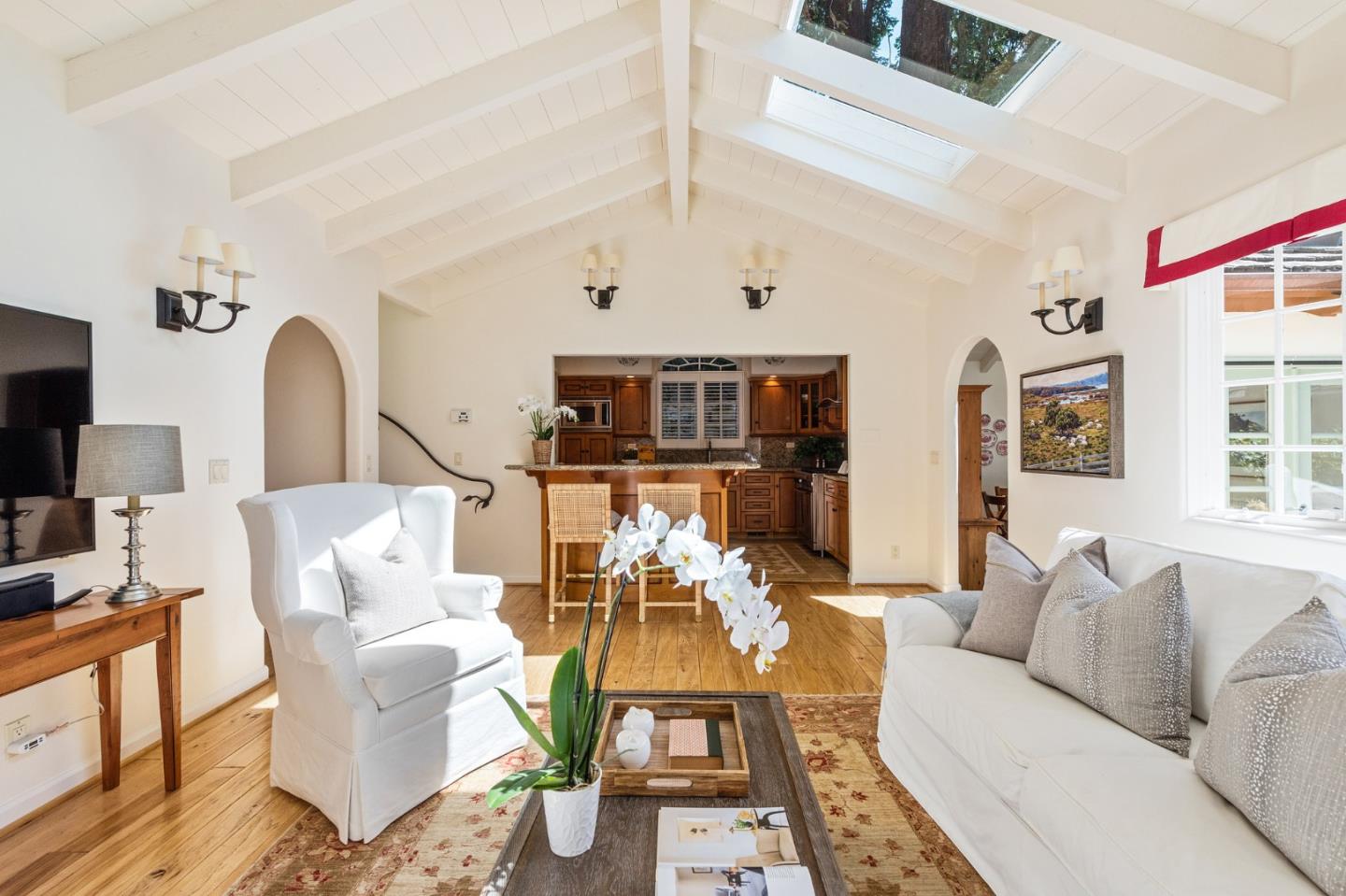 26335 Rio Avenue Carmel, CA 93923 - Photo 13 of 56 a living room with furniture and a flat screen tv