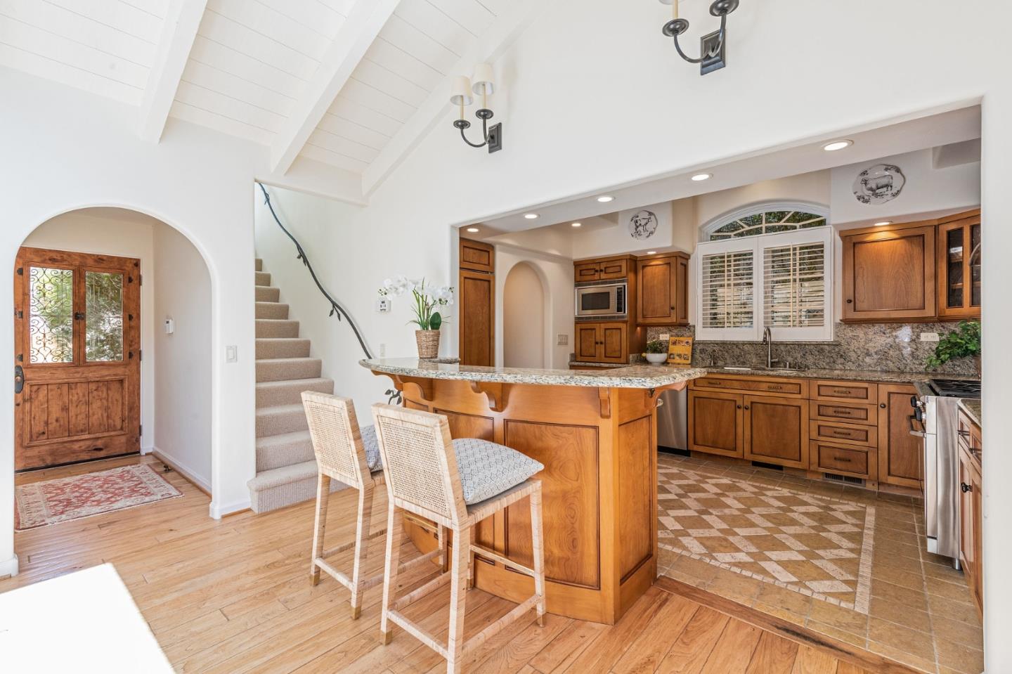 26335 Rio Avenue Carmel, CA 93923 - Photo 14 of 56 a dining room with wooden floor and furniture