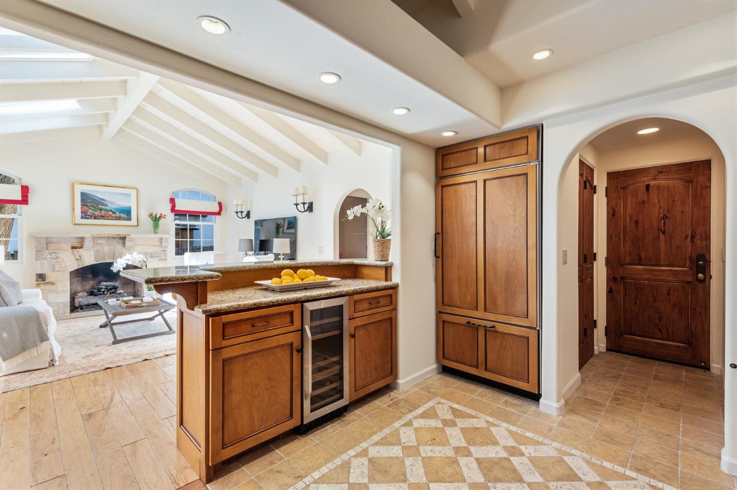 26335 Rio Avenue Carmel, CA 93923 - Photo 18 of 56 a view of a kitchen with stainless steel appliances granite countertop a stove and a refrigerator