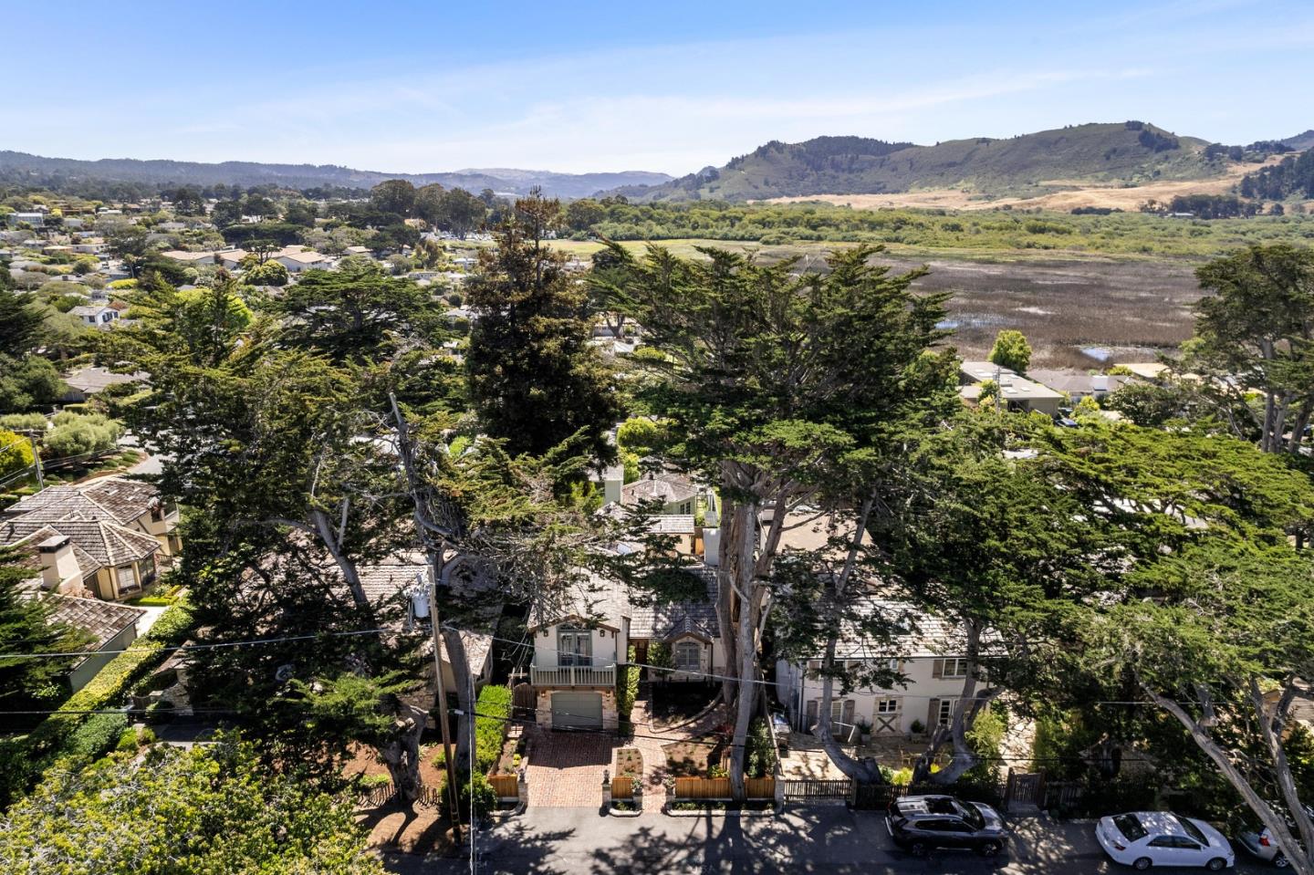26335 Rio Avenue Carmel, CA 93923 - Photo 2 of 56 an aerial view of residential houses with outdoor space and trees