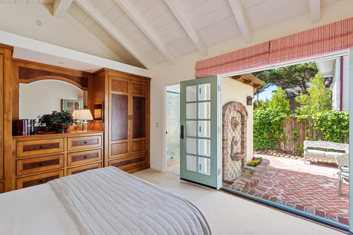 26335 Rio Avenue Carmel, CA 93923 - Photo 28 of 56 a bed room with a bed and a large window