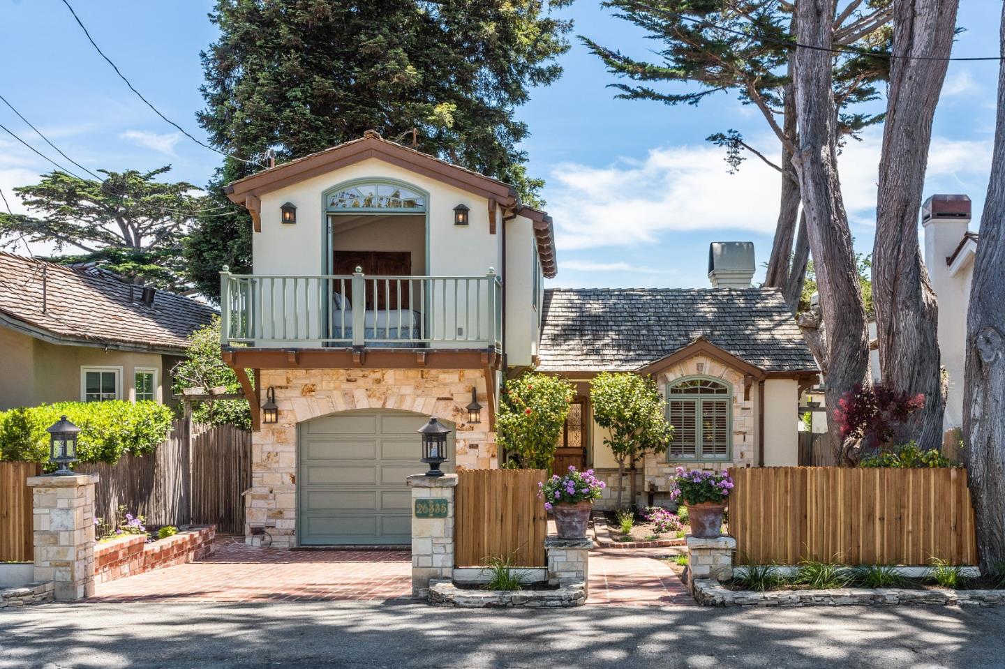26335 Rio Avenue Carmel, CA 93923 - Photo 3 of 56 a front view of a house with a yard