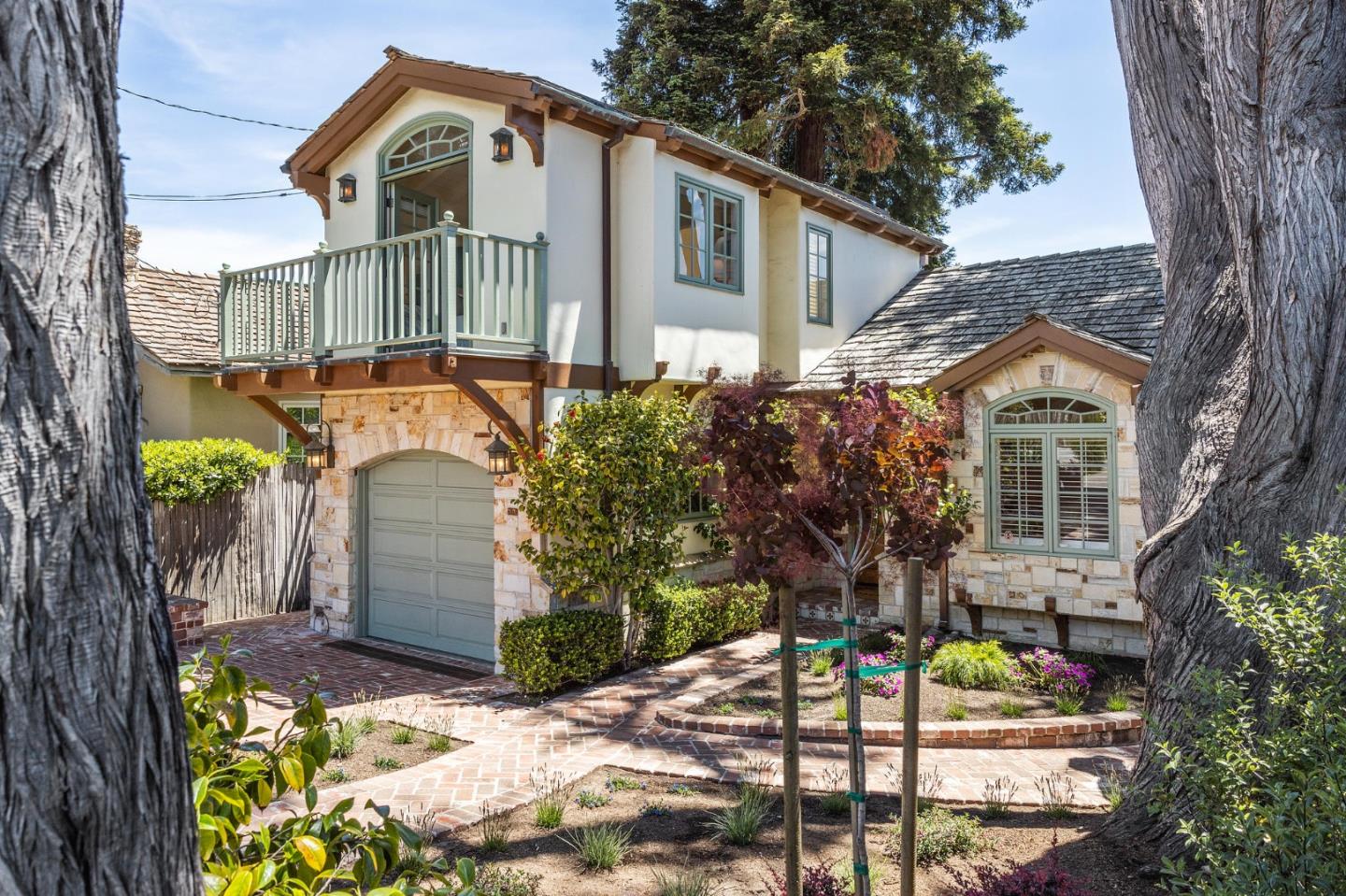 26335 Rio Avenue Carmel, CA 93923 - Photo 4 of 56 a front view of a house with a yard