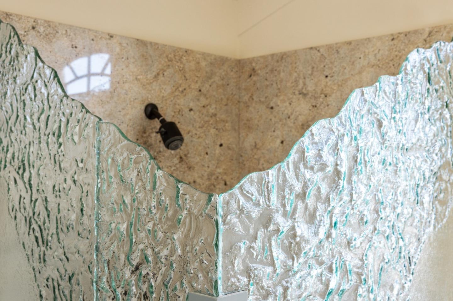 26335 Rio Avenue Carmel, CA 93923 - Photo 45 of 56 a bathroom with a sink and mirror