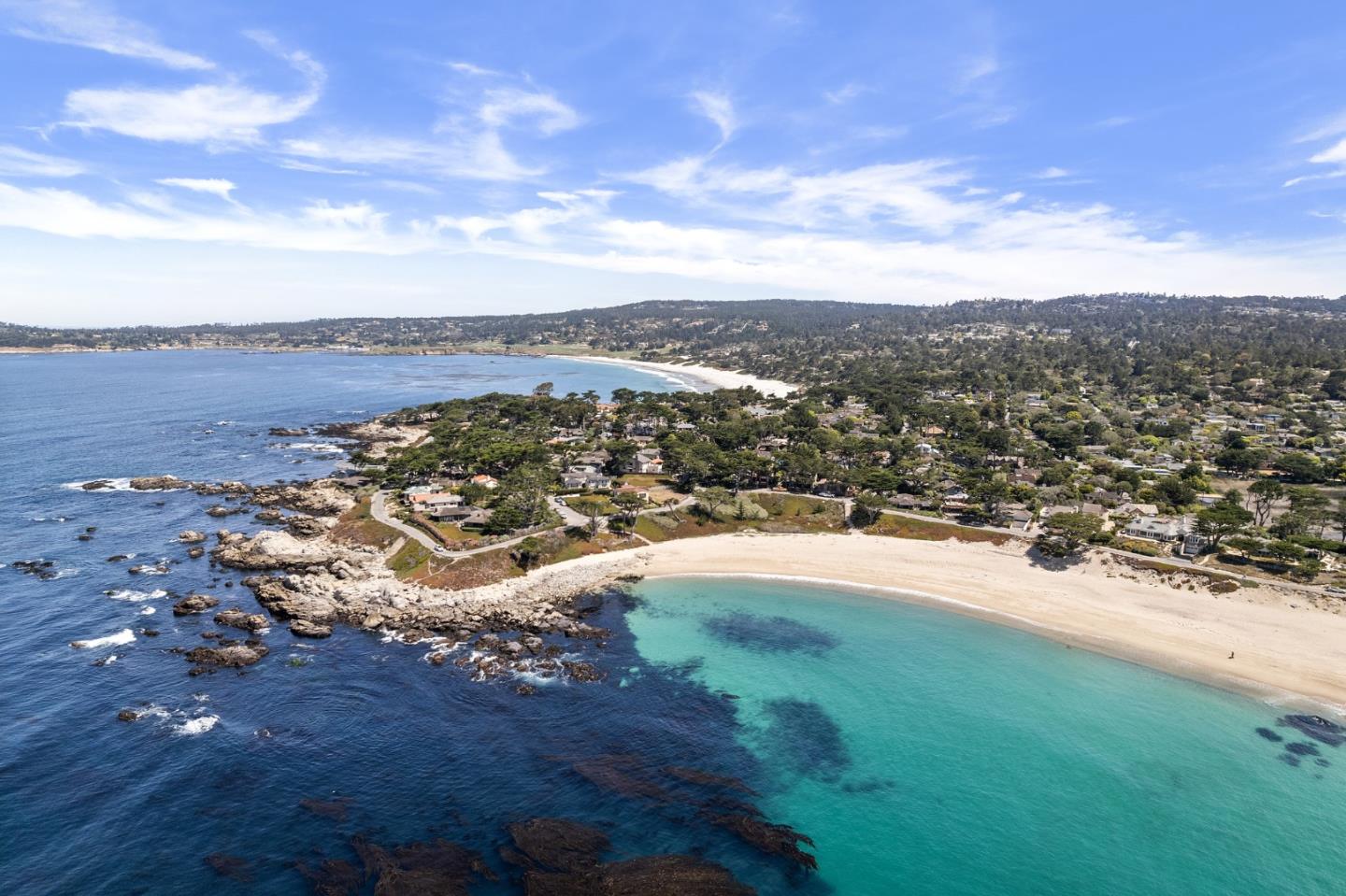 26335 Rio Avenue Carmel, CA 93923 - Photo 54 of 56 a view of a lake with mountains in the background
