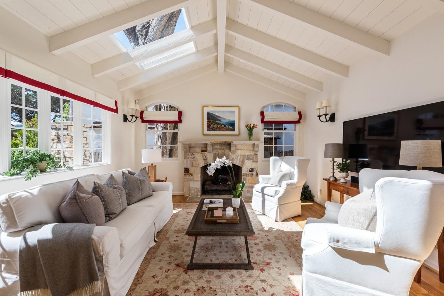 26335 Rio Avenue Carmel, CA 93923 - Photo 10 of 56 a living room with furniture and a flat screen tv