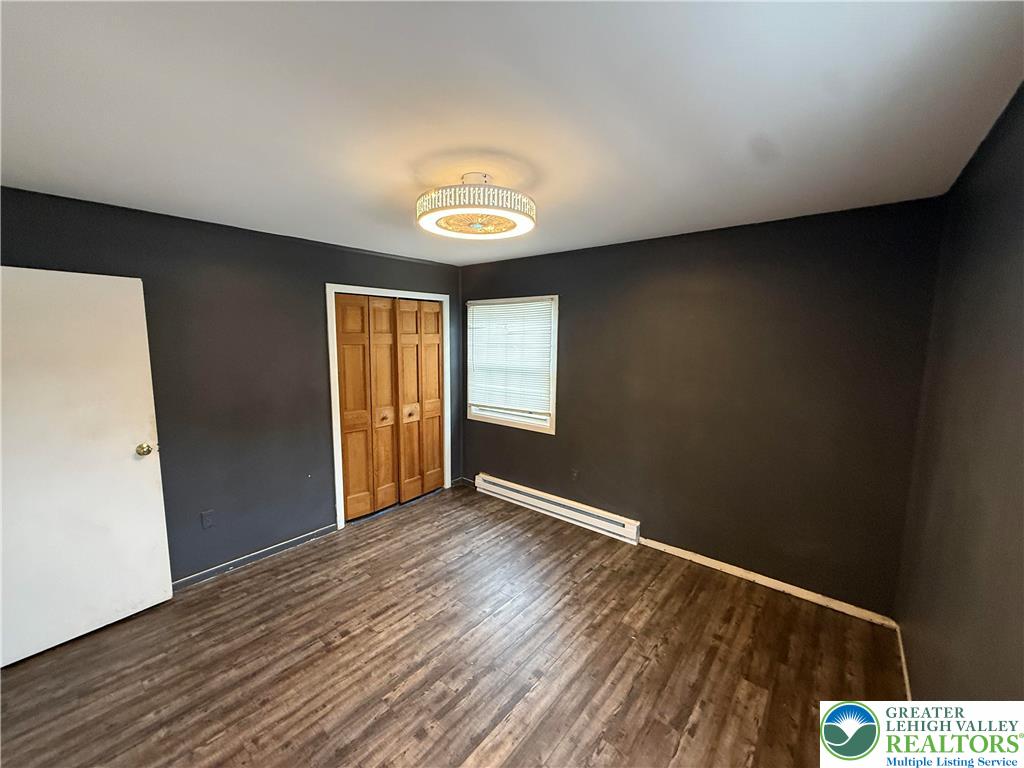 730 East Main Street Weatherly, PA 18255 - Photo 13 of 16 a view of an empty room with wooden floor and a window