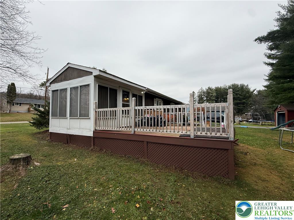 730 East Main Street Weatherly, PA 18255 - Photo 3 of 16 a view of a house with a roof deck