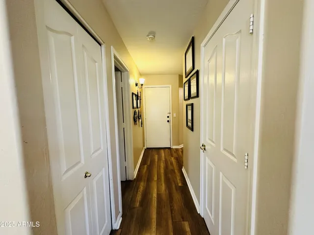 a view of a bathroom from the hallway