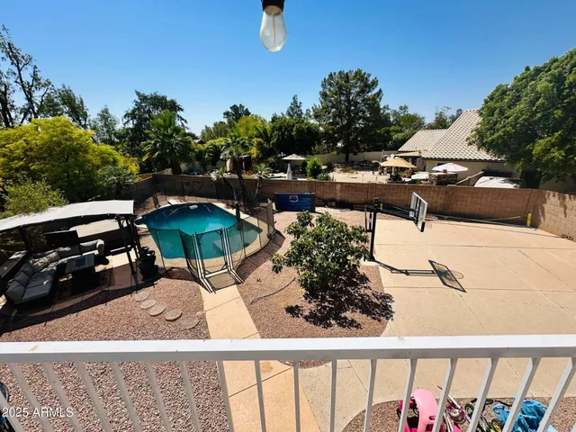 a view of a terrace with chairs
