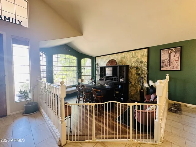 a view of staircase with furniture and stairs