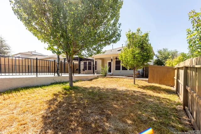 a front view of a house with patio