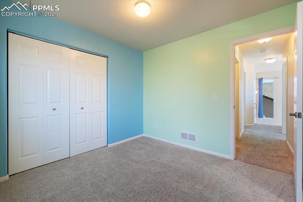 13038 Devil's Thumb Place Peyton, CO 80831 - Photo 25 of 44 Upper Level Bedroom #3.