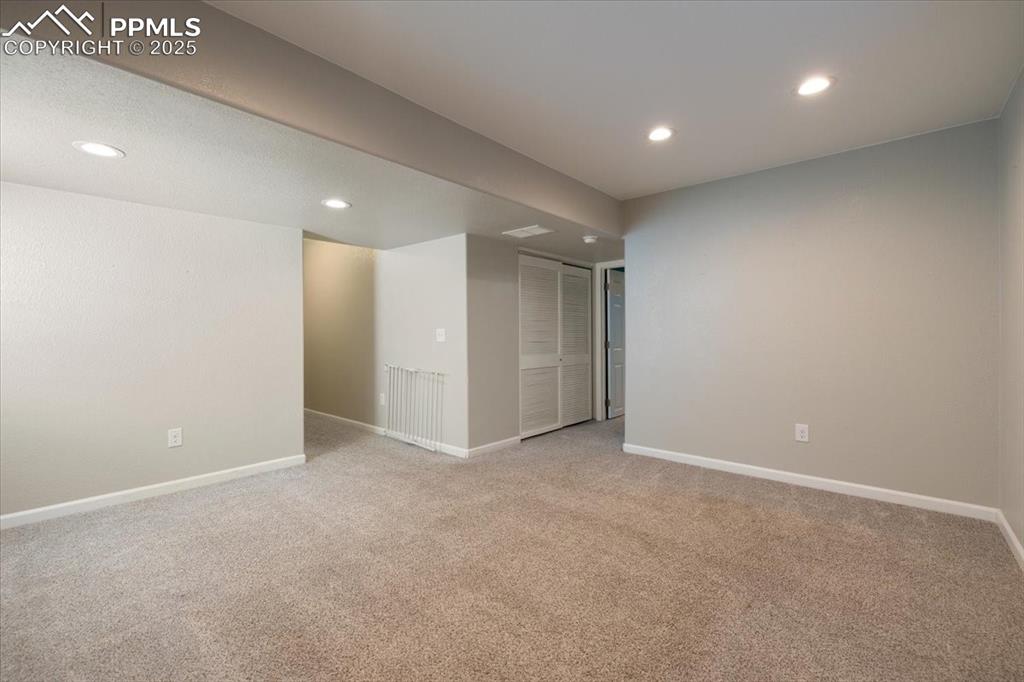 13038 Devil's Thumb Place Peyton, CO 80831 - Photo 30 of 44 Basement Flex Space with neutral carpet.