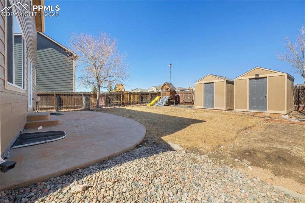 13038 Devil's Thumb Place Peyton, CO 80831 - Photo 36 of 44 Low maintenance, fenced level backyard.