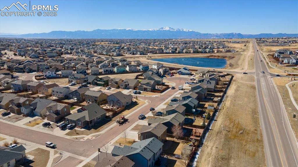 13038 Devil's Thumb Place Peyton, CO 80831 - Photo 43 of 44 Aerial view of neighborhood with Pikes Peak views.