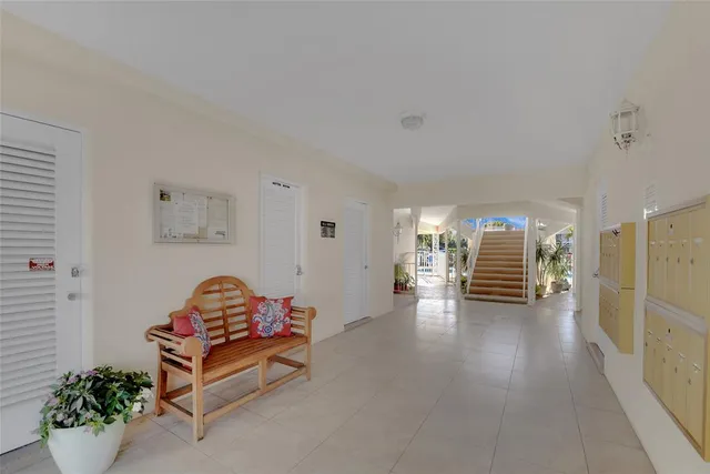a view of livingroom with furniture and a potted plant