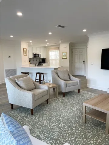 a living room with furniture and a couch