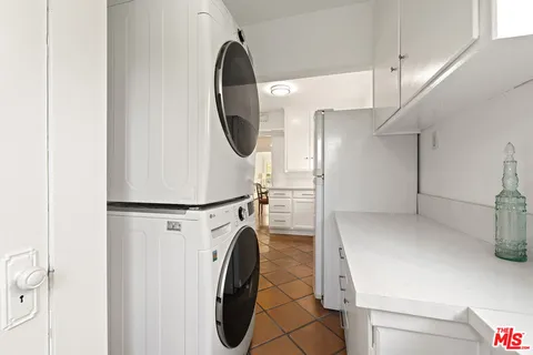 a view of a storage & utility room with washer and dryer