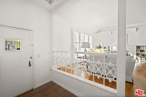 a very nice looking dining room with a large window