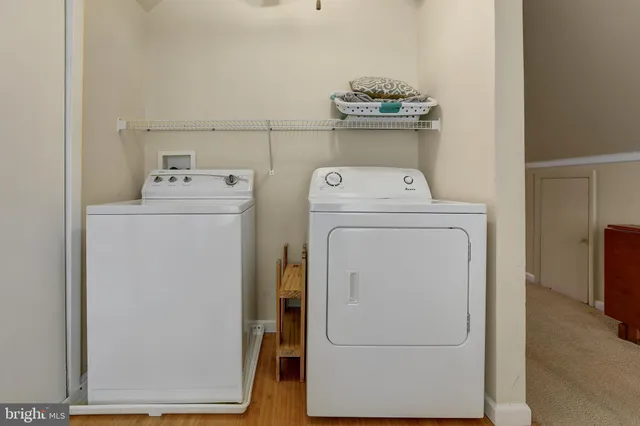 a bathroom with a shower sink vanity and mirror
