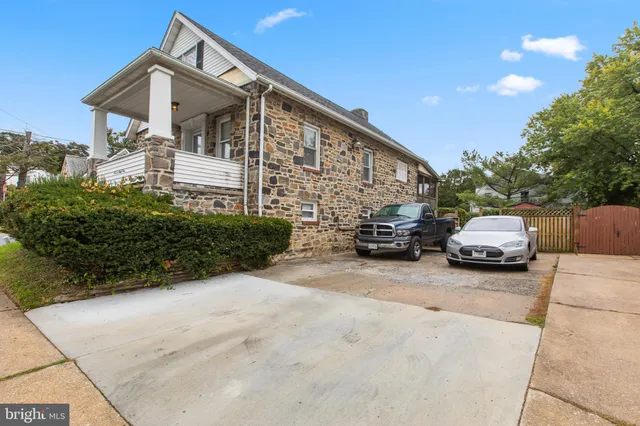a car parked in front of a house